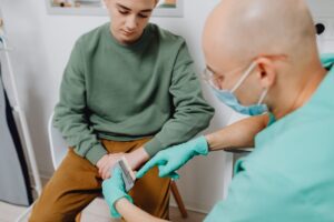Dentist providing urgent dental treatment